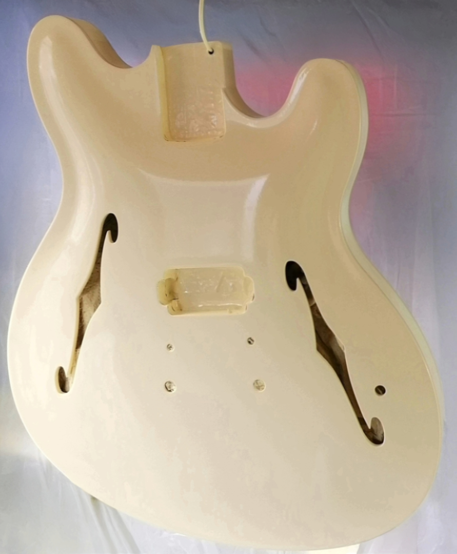 Flat Colour guitar body refinish.