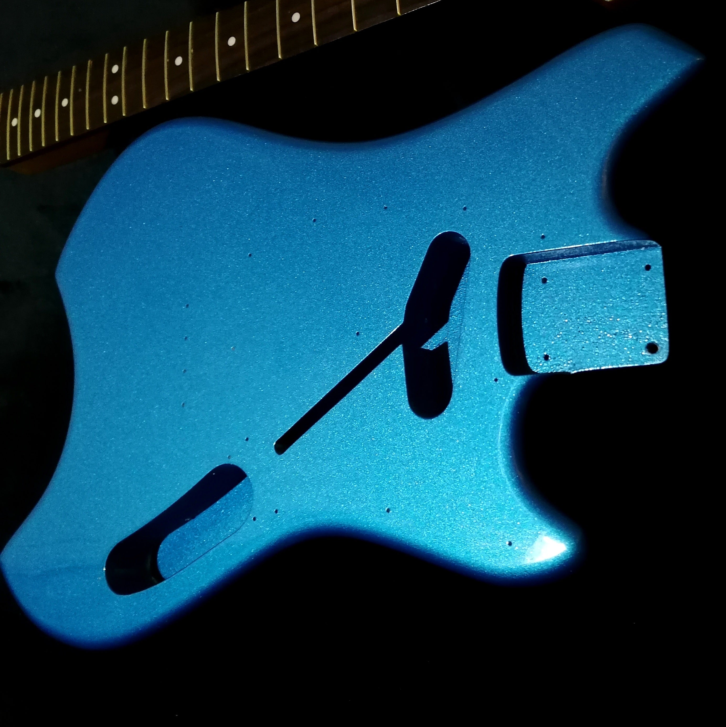 Metallic, Sparkle and Flake guitar body refinish