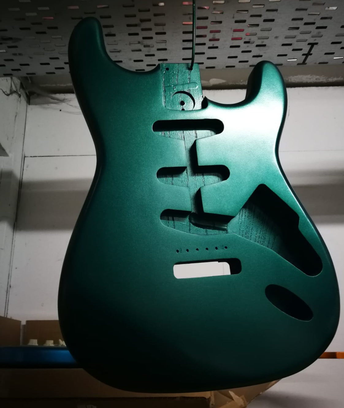 Flat Colour guitar body refinish.